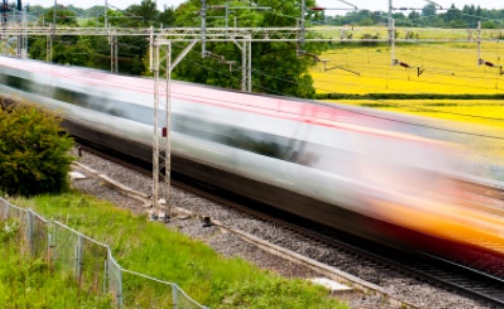 High speed train speeding by in a blur