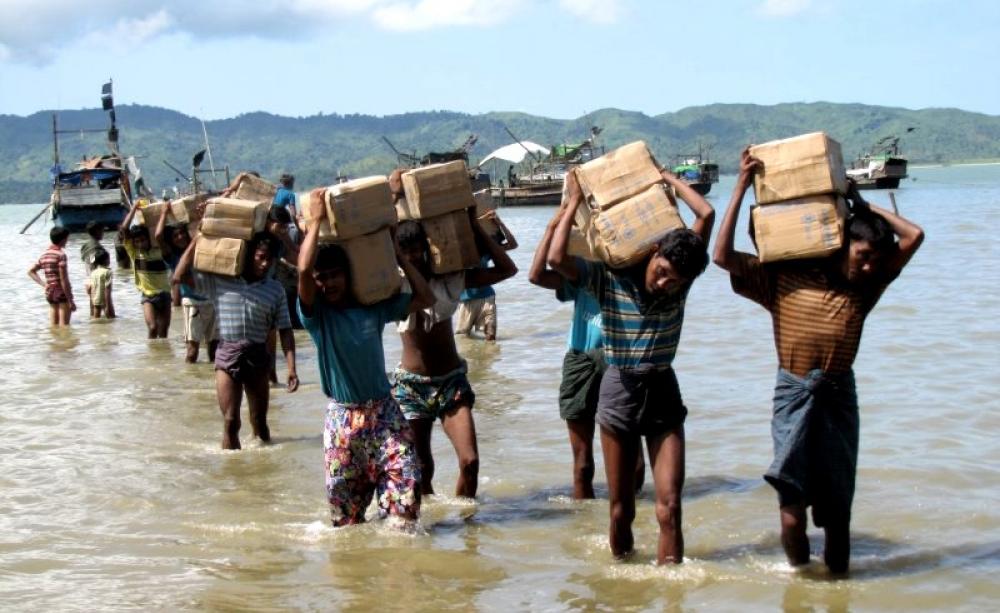 Condemned to a life of misery and discrimination: one camp for Rohingya refugees near Sittwe, Rakhine State, can only be accessed by sea with boats transporting vital aid supplies such as rice and cooking oil. Photo: Mathias Eick, EU/ECHO, September 2013