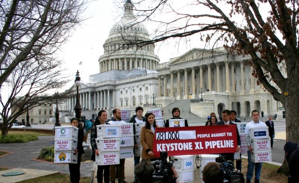The US Government finally decided to refuse the KXL pipeline last November after years of protests like this one in 2012. But now US taxpayers may be on the hook for $15 billion under the NAFTA 'free trade' agreement. Photo: 350.org via Flickr (CC BY-NC-S