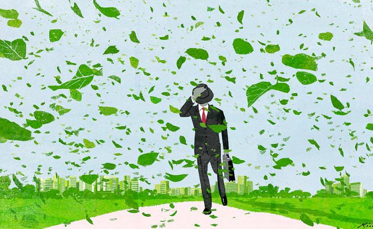 Illustration of a man walking against the wind, with leaves blowing