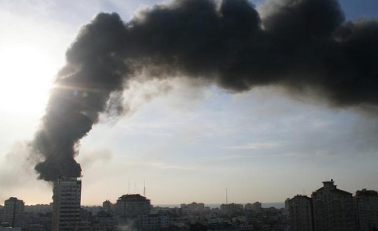 Black smoke billows from the UNWRA compound set ablaze by Israel in Operation Cast Lead, 15th January 2009. The compound was burned to the ground. Photo: Al Jazeera English via Flickr.