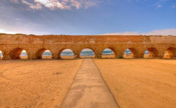 This roman aqueduct near Haifa in modern-day Israel took water to Caesaria, the civilian and military capital of Judaea. But ultimately, most of the water flowed to Rome itself - if in virtual form. Photo: C. J.™ via Flickr.