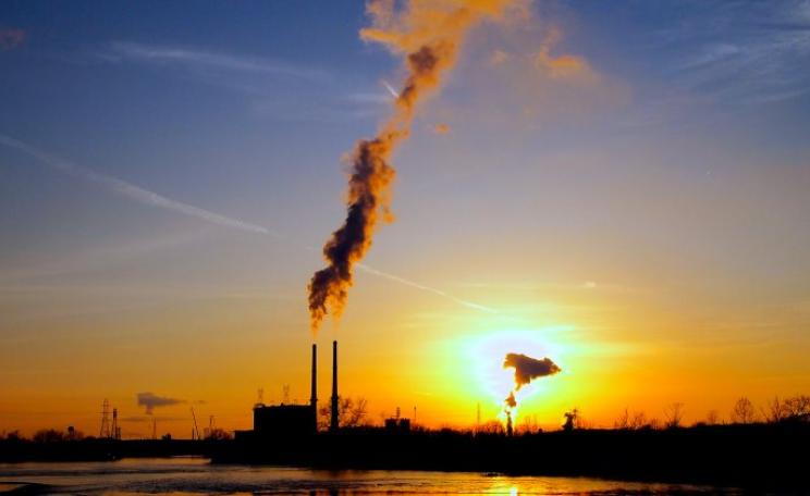 Sunset years ... power plant and Exxon Mobil oil refinery in Joliet, Illinois. Photo: Greg Wass via Flickr (CC BY-NC-SA).