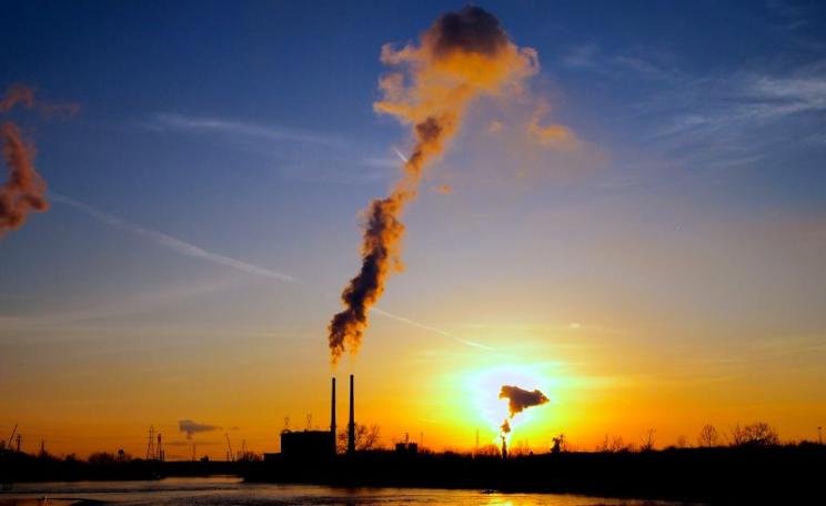 Sunset years ... power plant and Exxon Mobil oil refinery in Joliet, Illinois. Photo: Greg Wass via Flickr (CC BY-NC-SA).