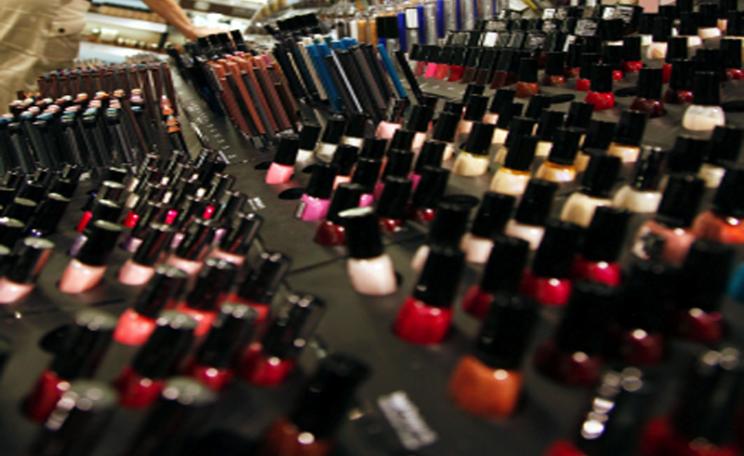 Selecting cosmetics in a chemist shop